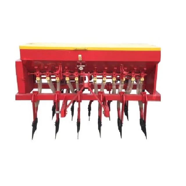 Red and yellow seed drill with multiple delivery tubes and soil-working parts