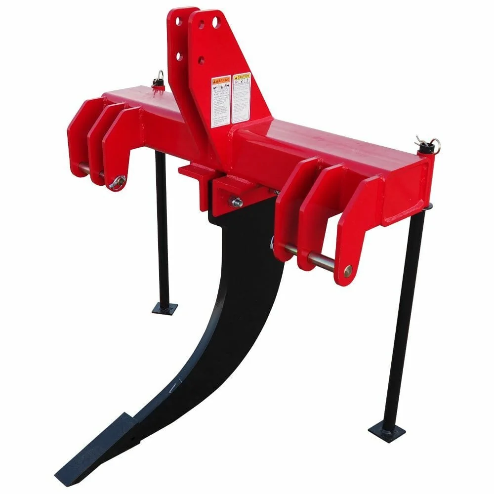Red three-shank soil-working implement with its upper connection bracket visible